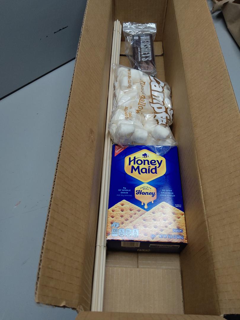 Wooden Sticks Size 2ft , Crackers (Honey Maid )BBD :21/03/2026, Chocolate (Hershey's) BBD: 06/2026, Marshmallows (Campfire ) BBD: 04/11/2026