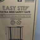 Regalo Safety 29-49" Easy Step Extra Wide Baby Gate for Doorways & Bottom of Stairs, Pressure Mounted Safety Gate with Door for Babies, Toddlers & Pets, Platinum