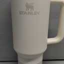 STANLEY Quencher H2.0 Tumbler with Handle and Straw 40 oz | Flowstate 3-Position Lid | Cup Holder Compatible for Travel | Insulated Stainless Steel Cup | BPA-Free | Cream 2.0