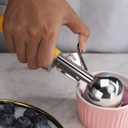 New Star Foodservice 537713 Commercial-Grade Thumb Press Food Disher/Ice Cream Scoop, 18/8 Stainless Steel, 2 oz, Size 20, Orange