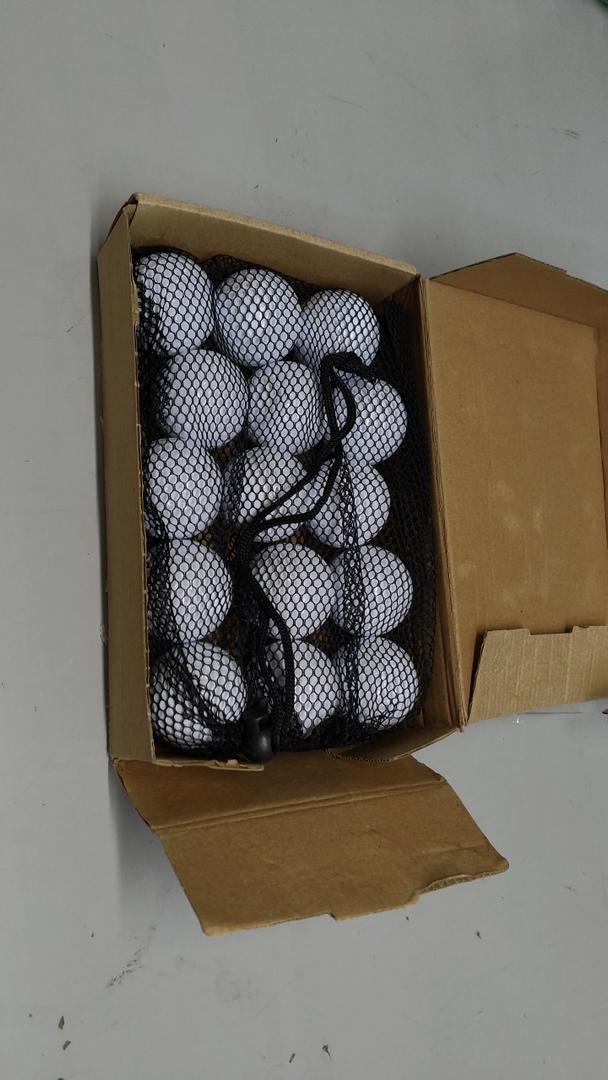 15 white golf balls