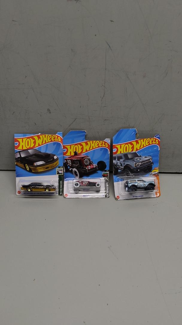 Pack Of 3 Hot Wheels Cars (Matt and Debbie, Max Steel, '21 Ford Bronco)