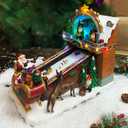 MOMENTS IN TIME Animated Santas Toy Shop Conveyor Belt Lighted Christmas Village Building with LED Lights, Music & Moving Sleigh Scene Plug-In Power Adapter Included