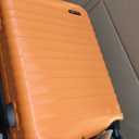 Amazon Basics 21" Hardside Carry-On Luggage, Hardshell Suitcase With Wheels, Expandable For Up to 25% More Space, With Scratch-Resistant Surface, Four Multi-directional Wheels, Orange