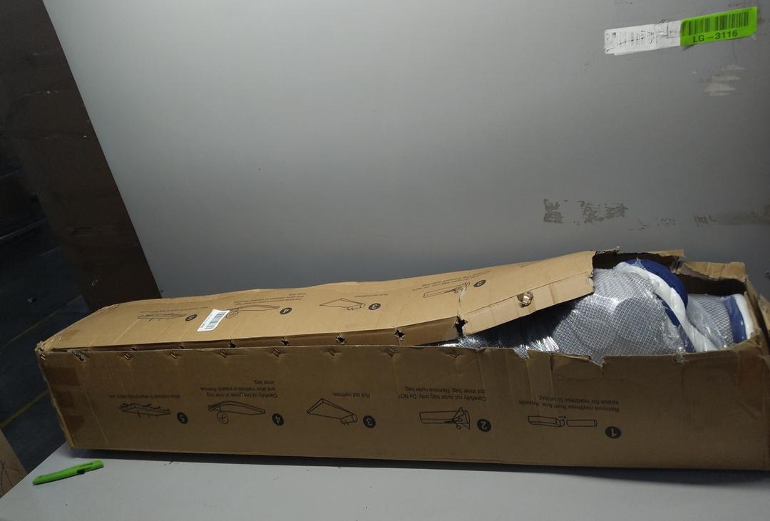 Rolled-up foam mattress topper