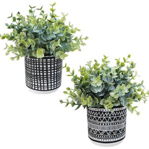 Winlyn Set of 2 Small Potted Plants Artificial Eucalyptus Plant in Black Geometric Ceramic Pots Faux Potted Greenery 7.1" Tall for Desktop Modern Home Office Living Room Kitchen Table Decorations