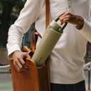 Owala FreeSip Sway Insulated Stainless Steel Water Bottle with Two-Way Spout, Built-In Straw and BucketHandle, Made for Travel, School, and Sports, 30oz, BPA Free, Leak Proof, Denim