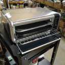 Ninja Digital Air Fry Countertop Oven, 8-in-1 Functionality, 1800W, Flip-Up Design, XL Capacity, Air Fry Basket, Wire Rack & Crumb Tray, Silver, SP101