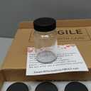 12 Pack 2 oz Glass Shot Mini Bottles with Black Lids - Reusable Leakage-Proof Small Clear Jar for Ginger, Wellness Shot, Juice, Sample, Whiskey, Essentials - Wide Mouth Containers, Dishwasher Safe