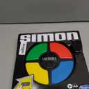 Hasbro Gaming Simon Handheld Electronic Memory Game With Lights and Sounds for Kids Ages 8 and Up