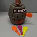 TOMY Pop Up T-Rex Board Game - Family and Preschool Kids Games for Family Game Night - Kids Activities and Jurassic World Toys - 2-4 Players - Ages 4 Years and Up