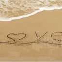 Design Art Love Written on Sandy Seashore Contemporary Seascape Metal Wall Art, 28x12