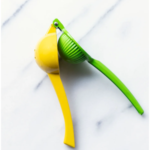 Lime Squeezer with Grip Handle in Vibrant Green by Home Basics | Quick and Easy Citrus Juice Extraction with Built-In Strainer for No-Mess Operation