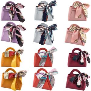 CALFOVERA 12 Pack 6 Colors Small Party Favor Boxes Reusable PU Leather Gift Candy Wrapping Bags with Handle Ribbon Mini Handbags for Weddings Party Guest Gift Bridal Showers Birthday Halloween