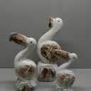 Deco 79 Wood Pelican Handmade Decorative Sculpture Distressed Home Decor Statues with Brown Accents, Set of 3 Accent Figurines 20", 16", 12"H, White