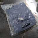 Amazon Essentials Women's Relaxed-Fit Lightweight Waterproof Long Hooded Rain Jacket