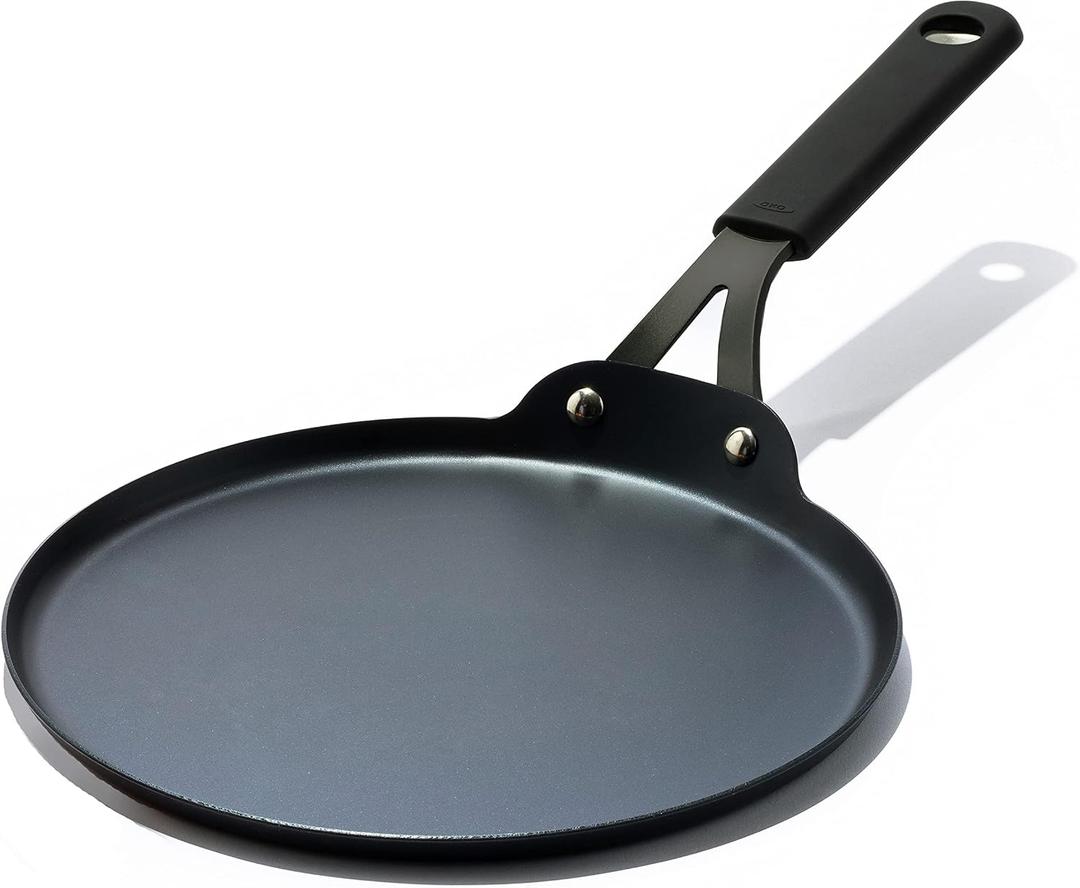 OXO Obsidian Pre-Seasoned Carbon Steel, 10" Crepe and Pancake Griddle Pan with Removable Silicone Handle Holder, Induction, Oven Safe, Black