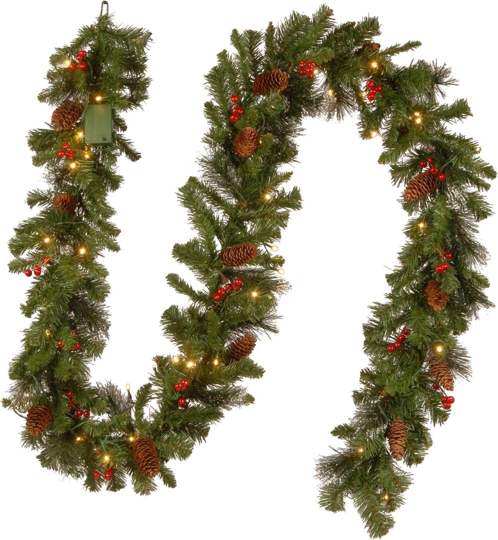 National Tree Company 9 ft Pre-Lit Crestwood Spruce Artificial Christmas Garland, Christmas Decoration with Glitter, Pinecones, Red Berries, 50 Warm White LED Lights, 180 Tips, Timer, Green, Battery-Operated