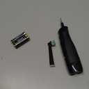 Oral-B Pro 100 CrossAction, Battery Powered Toothbrush, Black, 1 Count (Pack of 1)