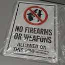SmartSign 14 x 10 inch No Firearms Or Weapons Allowed On This Property Metal Sign, 40 mil Laminated Rustproof Aluminum, Red, Black and White, Made in USA