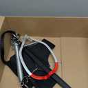 Jolly Jumper Iconic (Black), Doorway Baby Jumper, Indoor Exercise Saddle Seat, Adjustable Height, for Infants up to 28lbs, No Stand Required