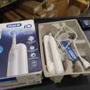 Oral-B Rechargeable Electric Toothbrush, iO2, 3 Cleaning Modes, Automatic Pressure Sensor to Protect Gums, Pure White