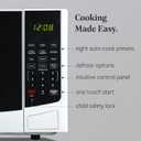 Farberware 0.9 Cu. Ft. Countertop Microwave Oven 900W Power, Auto Cook Settings, Defrost, and Safety Lock White