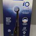OralB Rechargeable Electric Toothbrush, iO2 Starter Kit, 3 Cleaning Modes, Automatic Pressure Sensor to Protect Gums, 2 Brush Heads, Night Black