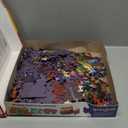 Springbok's Naughty or Nice 1000 Piece Jigsaw Puzzle is a Classic Image by Claudia McKinney of Santa Reviewing his Christmas Wish List