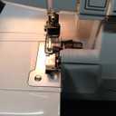 Brother Serger, 1034D, Heavy-Duty Metal Frame Overlock Machine, 1,300 Stitches Per Minute, Removeable Trim Trap, 3 Included Accessory Feet, White