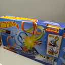 Hot Wheels Track Set with 4 Loops, 3-Way Crash Zone & Motorized Booster, Folds for Storage, with 1:64 Scale Toy Car