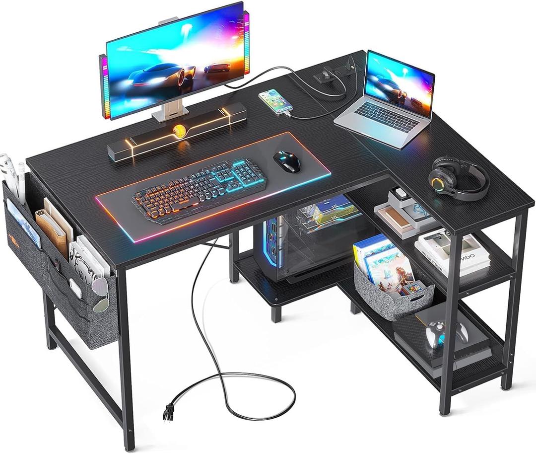 ODK 40 Inch Small L Shaped Gaming Computer Desk with Power Outlets, Reversible Storage Shelves & PC Stand for Home Office, Simple Writing Study Table with Storage Bag for Small Space, Black