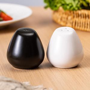Tanew Ceramic Salt and Pepper Shakers Set of 2, 2oz Farmhouse Style, Vintage Cute Mini Salt Shakers, Glossy White and Matte Black, Perfect for Compact Cooking, Travel, BBQ, Kitchen and Resturant Decor