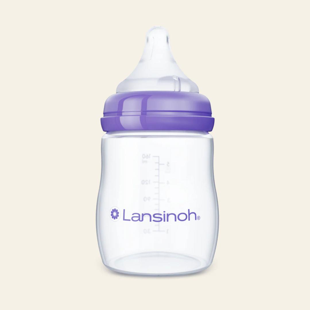 Lansinoh AntiColic Baby Bottles, BPAFree Plastic, 5 Ounces, 4 Count, Extra Slow Flow Nipples (Size XS), Breastfeeding Bottle with NaturalWave Design