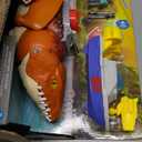 Fisher-Price Imaginext Jurassic World Rebirth Aquachomp Chase Mosasaurus 18-inch Dinosaur Toy with 3-inch Action Figure, Launcher Boat & 2 Projectiles