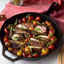 Lodge Cast Iron Skillet with Red Silicone Hot Handle Holder, 10.25-inch