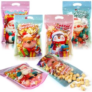 Honeydak 100 Pcs Christmas Sealing Treat Bags, 8.9 x 6.1 Inch Merry Christmas Sealed Pouch with Handles Resealable Santa Snowman Plastic Bags for Xmas Holiday Party Candy Gift Wrapping Supplies Decor