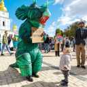 MXoSUM Inflatable Dinosaur Costume Blow up Triceratops Costumes for Adults Fancy Dino Onesies Party Halloween Cosplay Costume (Green, No Size)