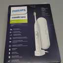 PHILIPS Sonicare ProtectiveClean 6100 Rechargeable Electric Toothbrush, with Pressure Sensor, 3 Cleaning Modes, SmarTimer and QuadPacer, 14-Day Battery Life, Travel Case, White, Model HX6877/21