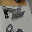 Hot Wheels Toy Car Track Set, Formula 1 Grand Prix Circuit Track Set with 3 1:64 Scale Die-Cast Toy Cars, Two Modes of Racing with a Motorized Booster