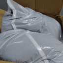 PetJett Small Dog Bed - 23'' Round Dog Beds, Calming Puppy Bed - Anti-Slip & Washable Super Soft Fluffy Plush Faux Fur Pet Bed, Anti-Anxiety Premium Comfort Donut Bed, Fits Dogs upto 25 lbs, Dark Gray