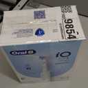 Oral-B Rechargeable Electric Toothbrush, iO3 Limited Deep Clean, 3 Cleaning Modes, Visual Pressure Sensor to Protect Gums, 2 Brush Heads, Travel Case, White (1 Count (Pack of 1))