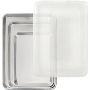 Nordic Ware Naturals 4 Piece Set - USA Made Aluminum Commercial Quality Pans for Baking or Roasting, Encapsulated Galvanized Steel Rim Prevents Warping; Quarter Sheet, Jelly Roll, Half Sheet with Lid