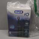 Oral-B Rechargeable Electric Toothbrush, iO Limited Simple Clean, 3 Cleaning Modes, Automatic Pressure Sensor to Protect Gums, Travel Case, Night Black (1 Count (Pack of 1))