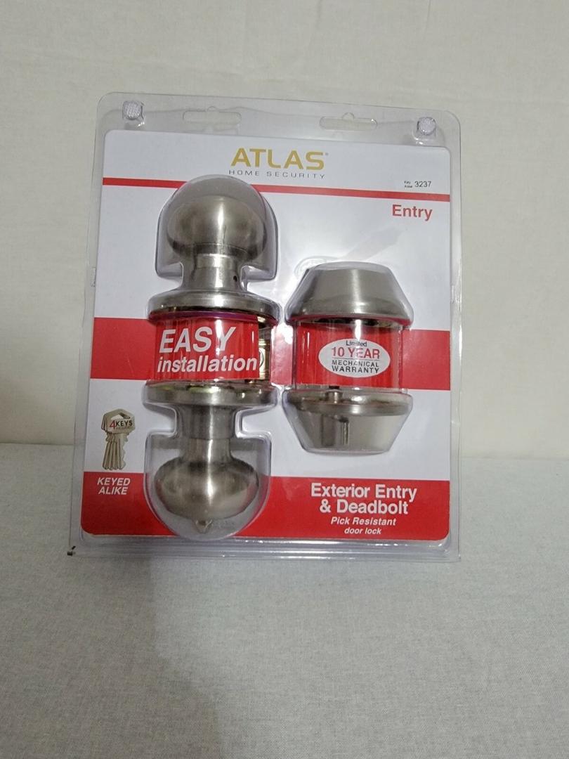 Atlas Tulip Door Knob with Lock, Antique Brass