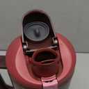 Owala FreeSip Tumbler Insulated Stainless Steel Water Bottle with Built-in Straw and Side Handle, For Travel, Work, School, and Sports, 40oz, BPA Free, Leak Proof, Black Cherry