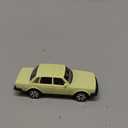 Matchbox 1986 Volvo 240 [Yellow] 122/125, 1:64 Scale Diecast Toy Vehicle