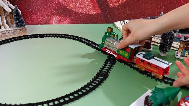 Thyle 10 Pcs Mini Christmas Village Train Decoration Include 1 Christmas Train Set, 3 Resin Village Houses, 6 Mini Sisal Snow Trees Under The Xmas Tree Decor Holiday Party Gifts, Battery Not Included