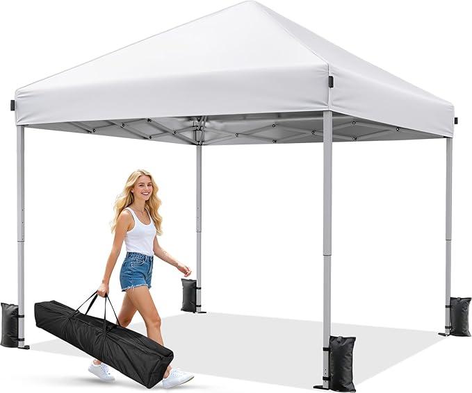 Driftalia 10x10 Pop Up Canopy Tent One-Push Center Lock, Portable Shelter | UPF 50+ Water-Resistant Fabric, 3 Adjustable Heights, Carry Bag, 4 Sandbags & 8 Stakes, for Backyard, Camping, Beach, Market