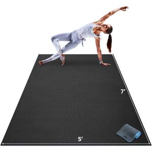 Gorilla Mats Premium Large Yoga Mat  7' x 5' x 8mm Extra Thick & Ultra Comfortable, Non-Slip Barefoot Exercise Mat  Works Great on Any Floor for Stretching, Cardio or Home Workouts (Onyx Black Mat with Gray / Blue Towel, 2 Storage Straps and Carry Bag)